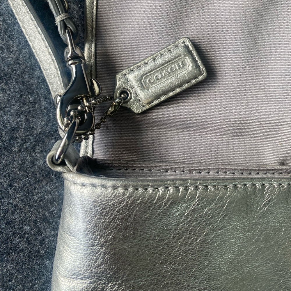 Coach Wristlet in Silver/Gold Depending on Lighting - Picture 6 of 13